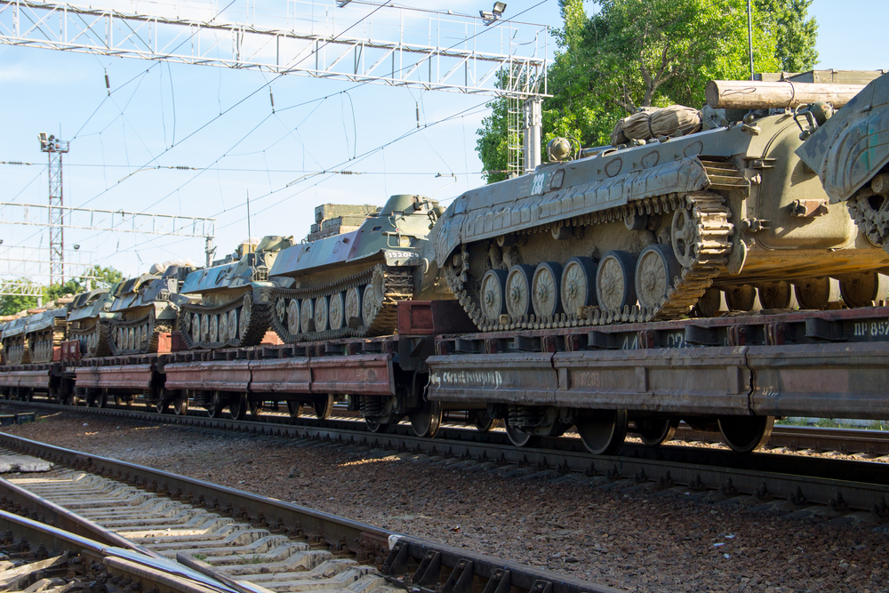 Cargo,Train,Carrying,Military,Tanks,On,Railway,Flat,Wagons