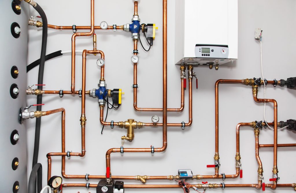 Heating,System,With,Copper,Pipes,,Valves,And,Other,Equipment,In