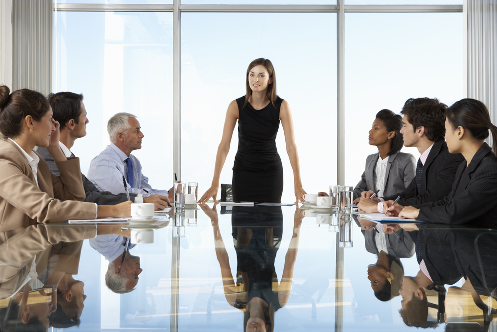 Group,Of,Business,People,Having,Board,Meeting,Around,Glass,Table