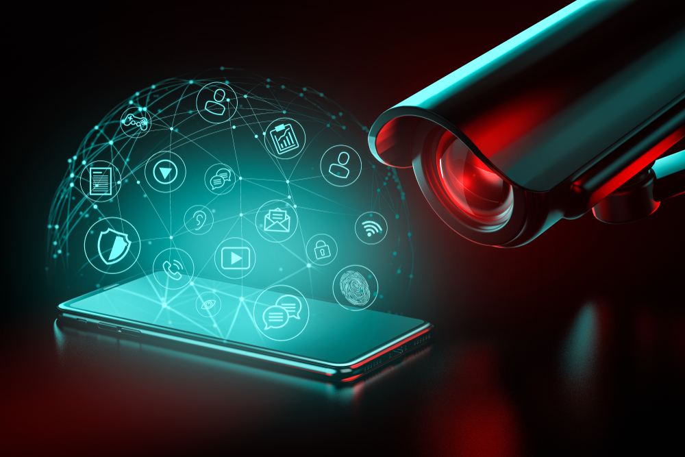 Big,Cctv,Focusing,On,A,Smartphone,And,Icons,Hovering,Above