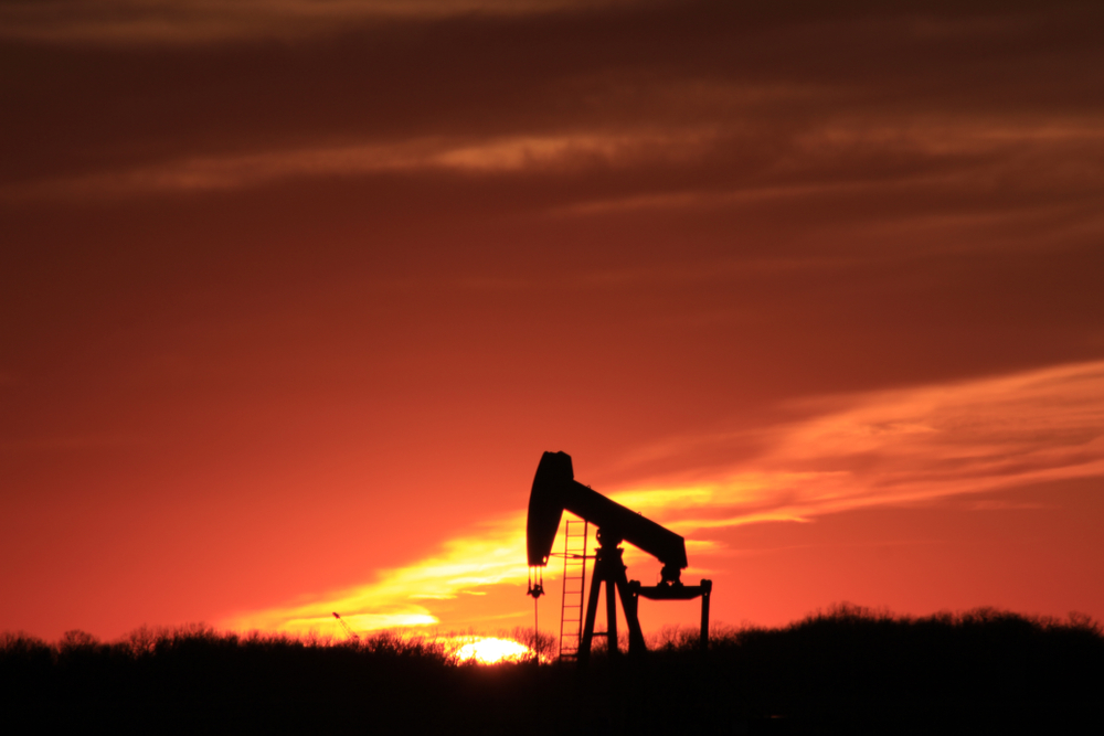 A,Shot,Of,A,Oil,Well,Pump,At,Sunset,With