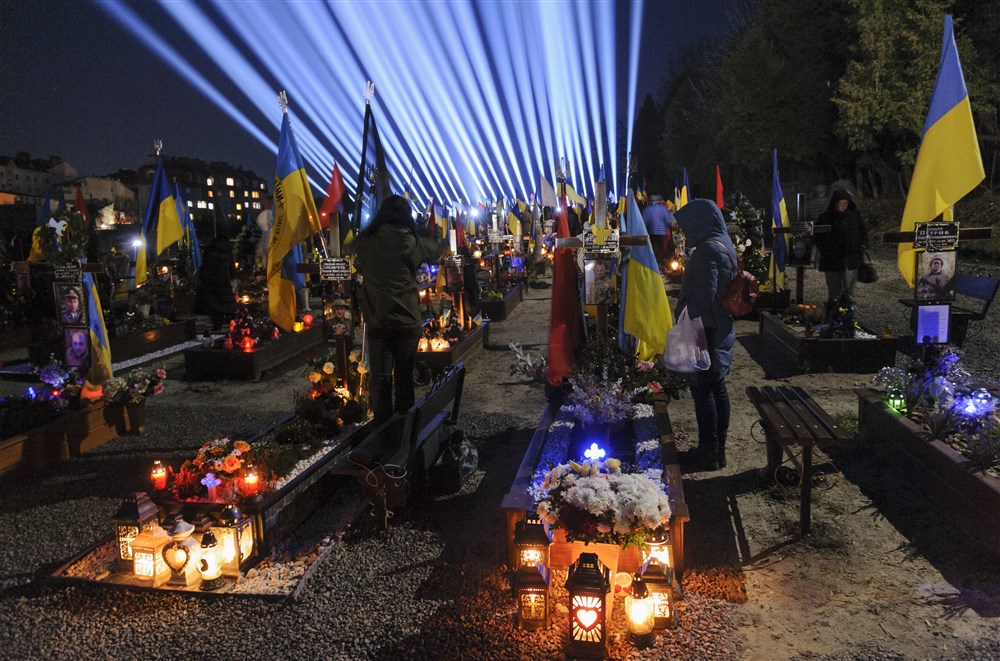 Friends and relatives of fallen Ukrainian soldiers take part in a joint prayer in Lviv