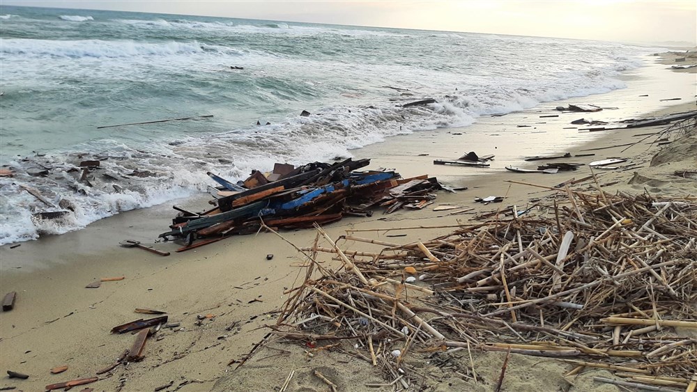 Dozens found dead in southern Italy after migrant boat sinks in rough seas