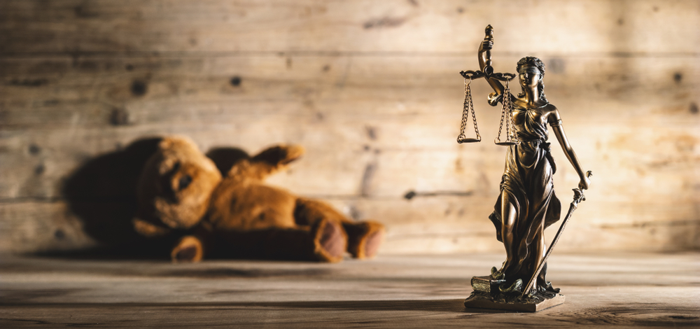 The,Statue,Of,Justice,Symbol,With,Teddy,Bear,,Legal,Law