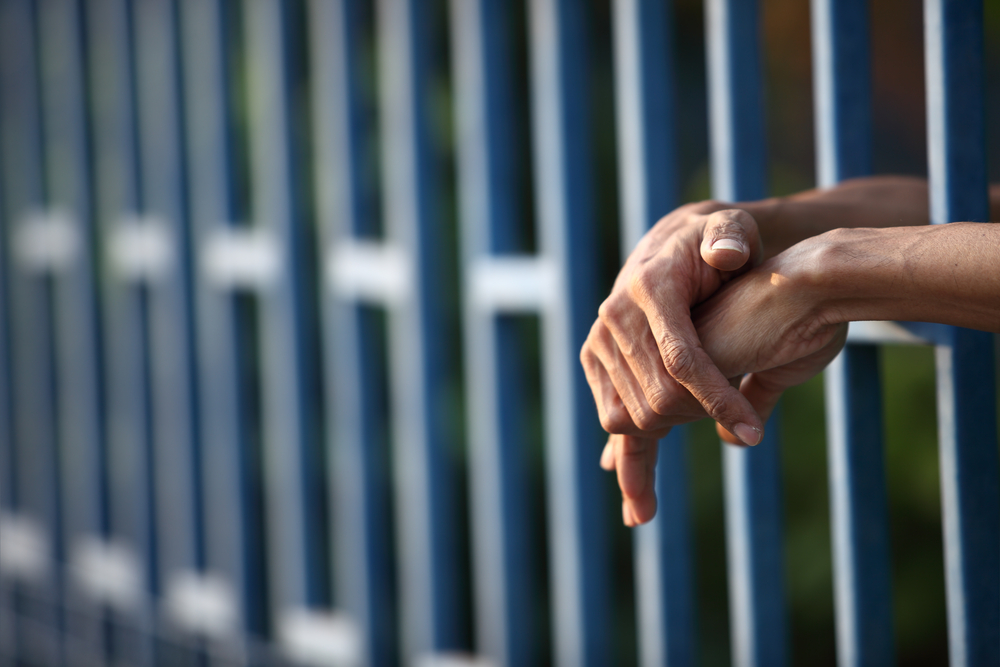 Hand,In,Jail.