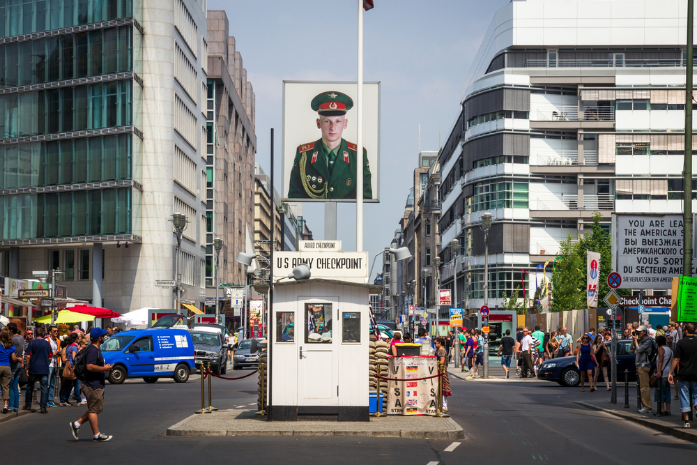 Tourists,Around,The,Former,Allied,Checkpoint,Charlie.,Nowadays,This,Site