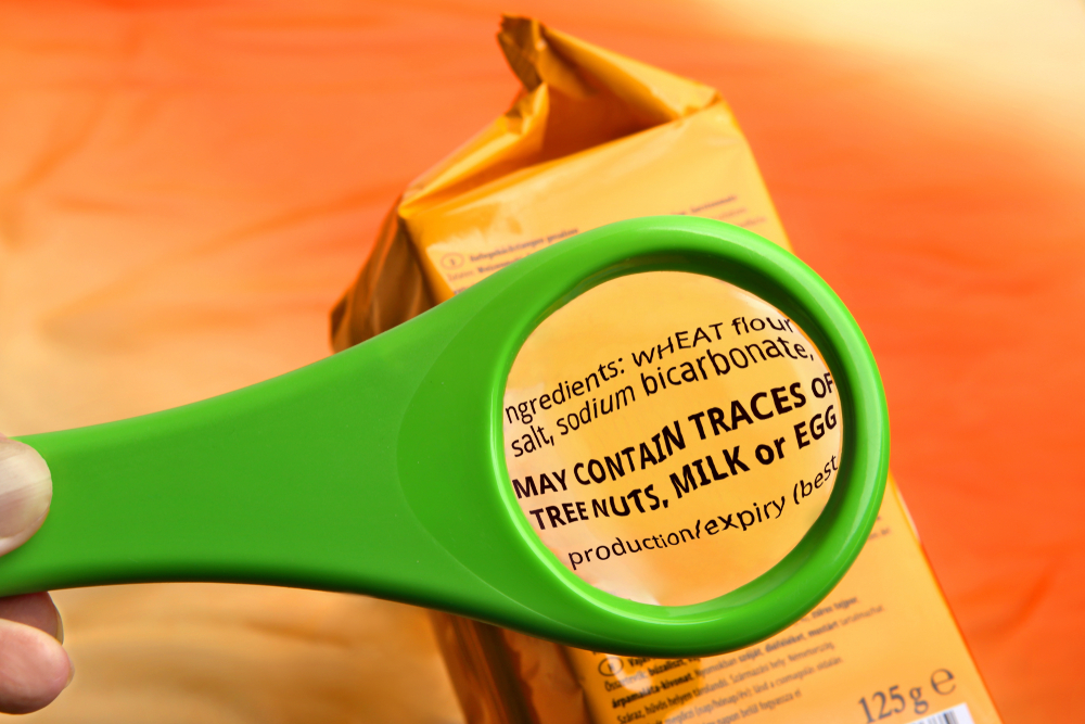 Magnifying,Glass,On,Food,Ingredients,And,Additives,Label.,Reading,Ingredients
