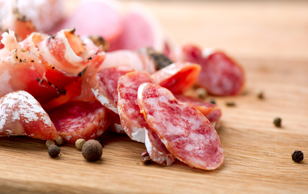 Sausage.,Dried,Smoked,Sausages,Sliced,On,Board