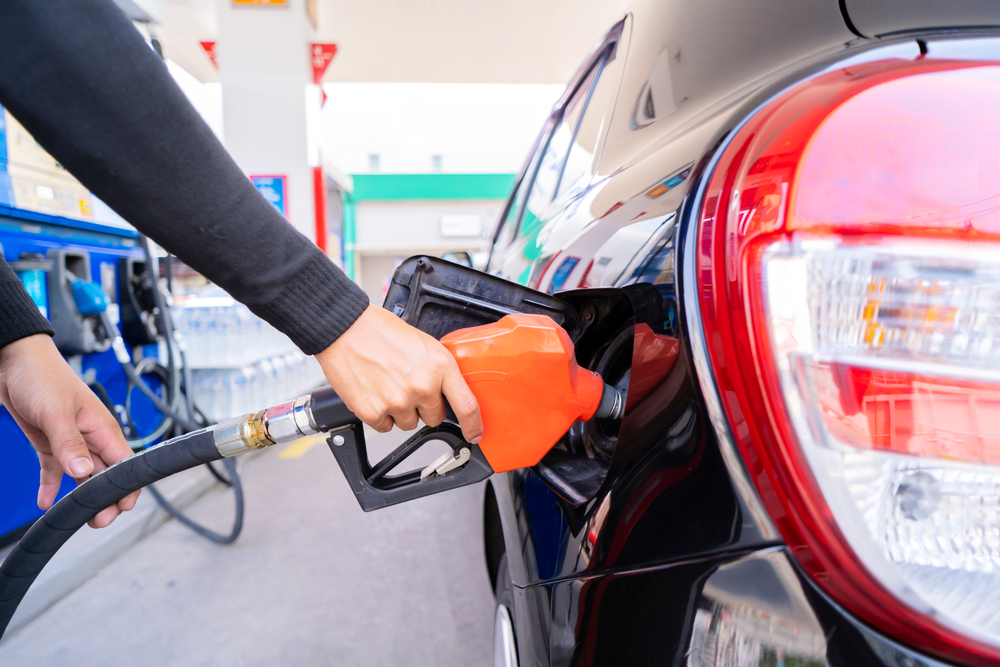 Refuel,Cars,At,The,Fuel,Pump.,The,Driver,Hands,,Refuel
