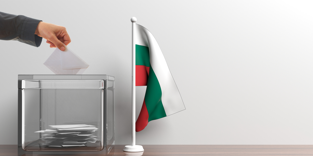 Bulgaria,Elections.,Voter,Holding,An,Envelope,,Glass,Ballot,Box,And