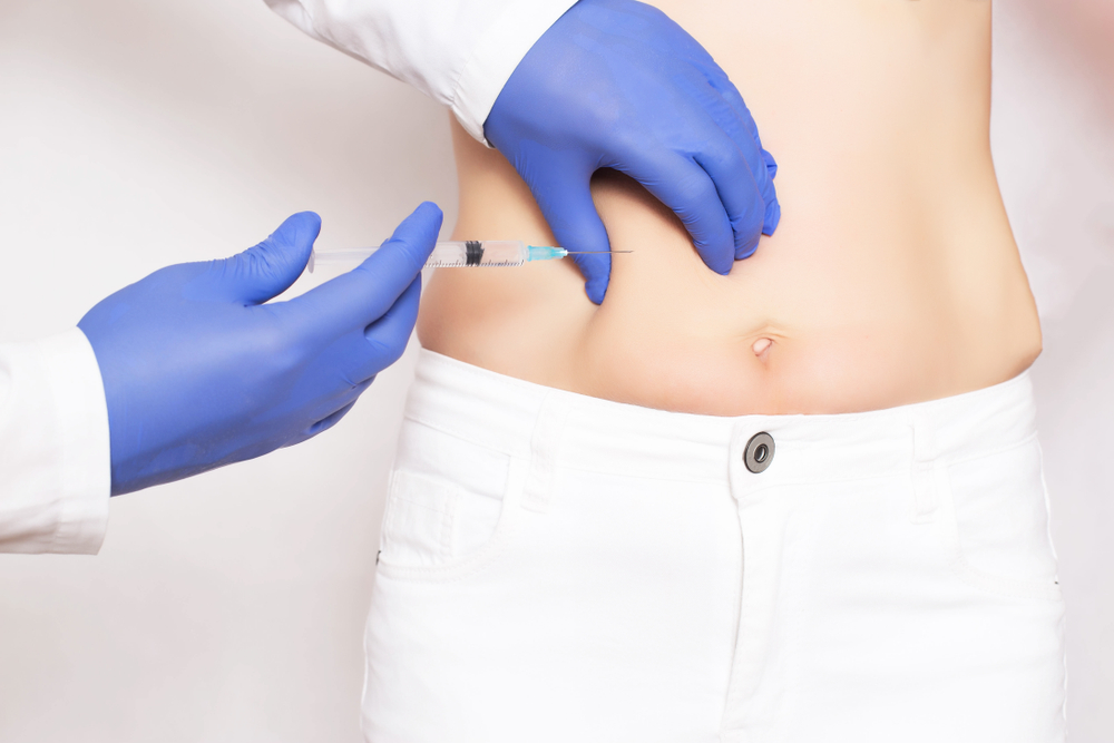 Doctor,Cosmetologist,Makes,Botox,Injections,And,Rejuvenation,In,The,Stomach