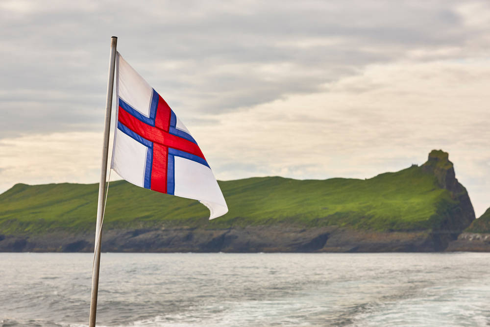 Faroe,Islands,Flag,Waving,On,Sunset,Sky.,Faroese,Green,Islands
