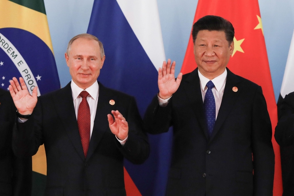 Russian,President,Vladimir,Putin,(l),And,Chinese,President,Xi,Jinping