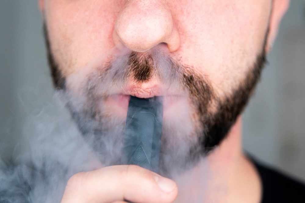 A,Man,Who,Smokes,An,Electronic,Cigarette