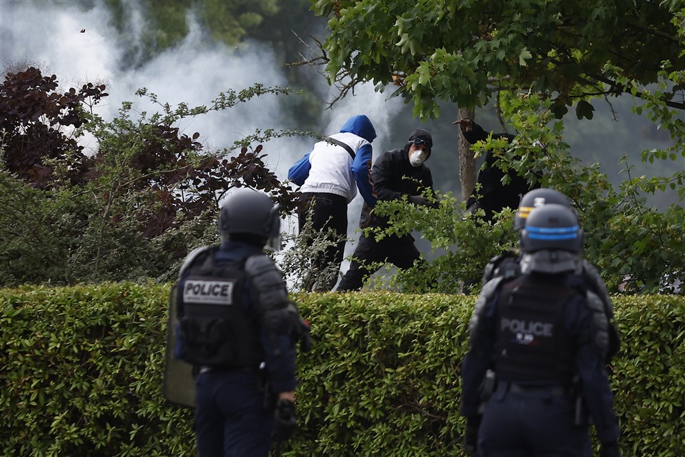 Clashes after a march in memory of teenager killed by police in Nanterre