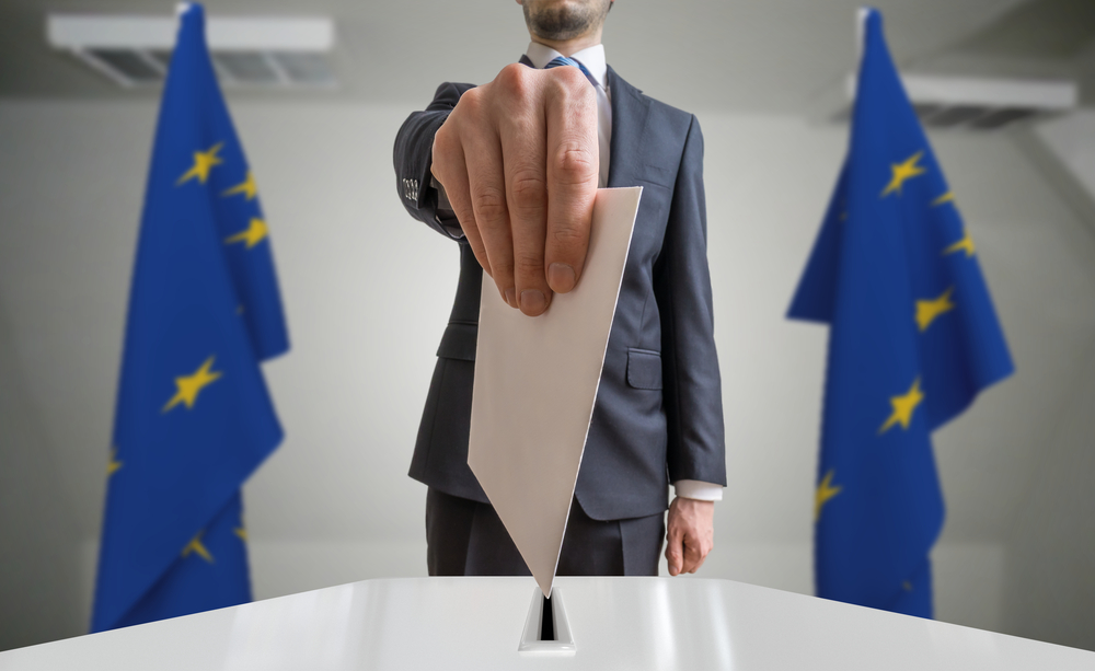 Election,Or,Referendum,In,European,Union.,Voter,Holds,Envelope,In