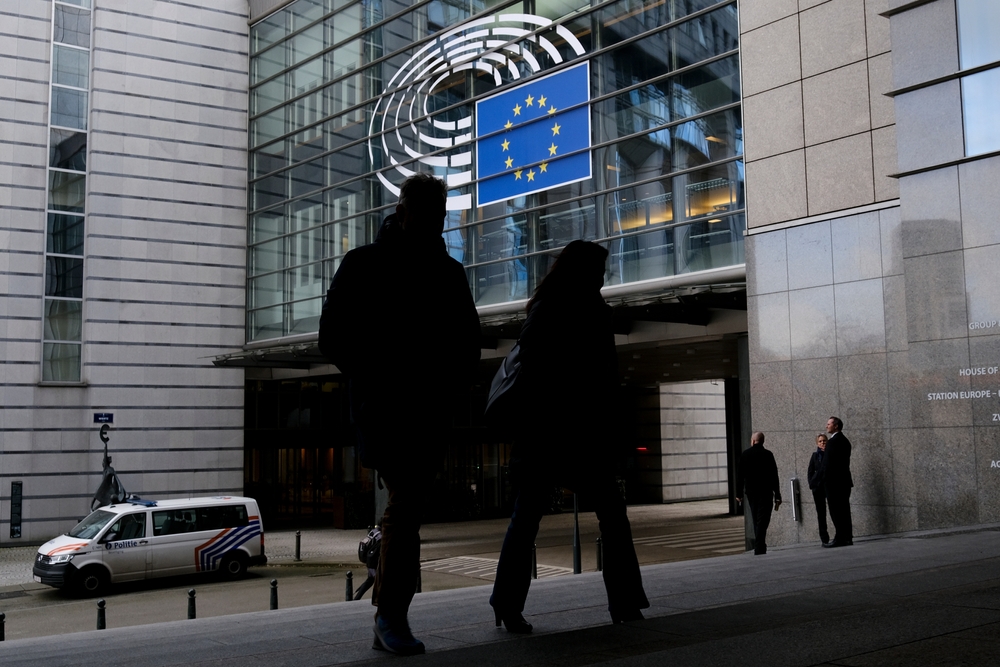 People,Walk,Outside,Of,The,European,Parliament,In,Brussels,,Belgium