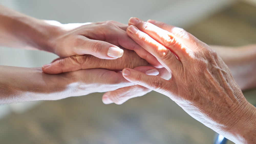 Holding,Hands,As,A,Symbol,Of,Support,And,Sympathy,In