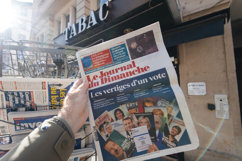 Paris,,France,-,Apr,11:,Man,Buy,Looks,At,Press