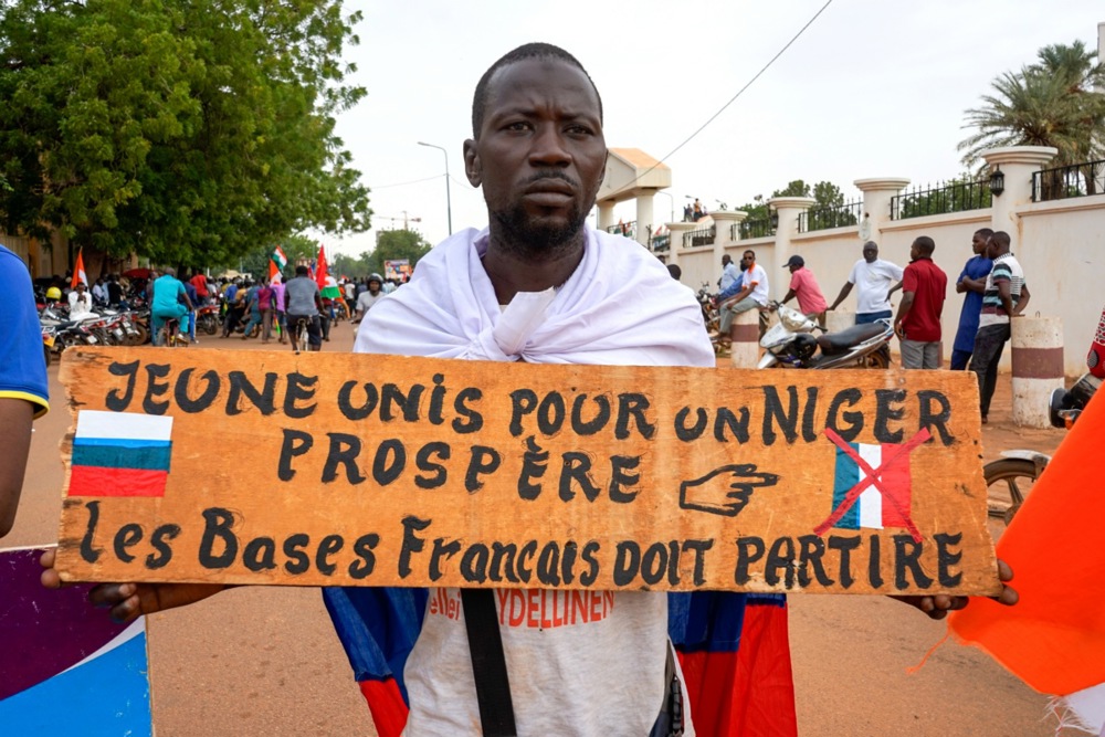 Supporters of the military junta protest against a potential military intervention in Niamey