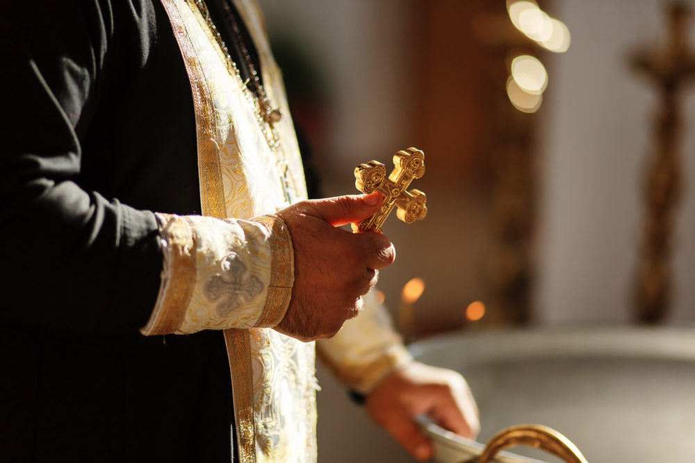 Russian,Eastern,Orthodox,Church,Priest,Holds,An,Orthodox,Cross,In