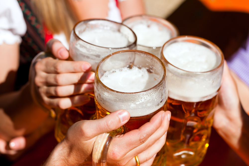 Four,Friends,With,A,Fresh,Beer,In,A,Beer,Garden;