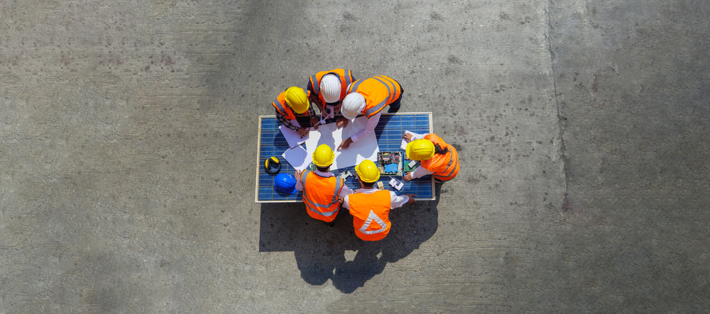 Top,View,Of,Architectural,Engineer,Working,On,Solar,Panel,And