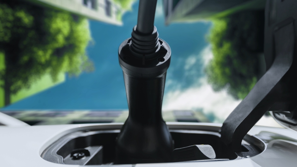 Future,Ev,Charger,Plugged,Into,Electric,Car,For,Electric,Recharging,