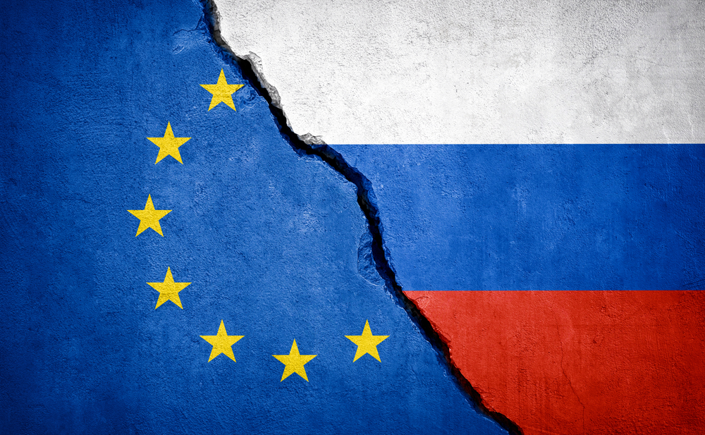 Eu,And,Russia,Conflict.,Country,Flags,On,Broken,Wall.,Illustration.