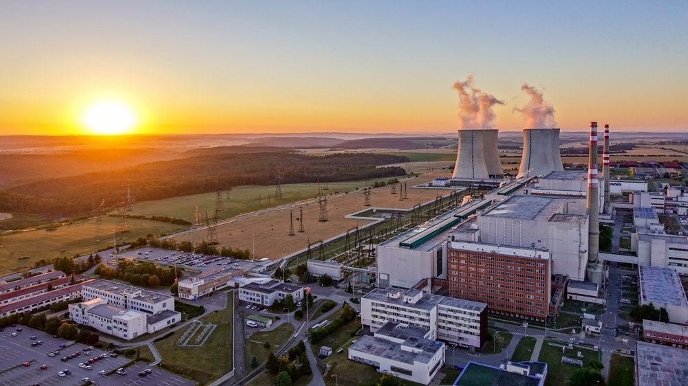 Sunrise,Over,The,Dukovany,Nuclear,Power,Plant,With,Cooling,Towers