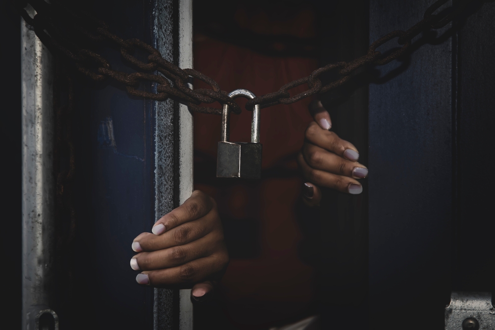 Unidentified,Woman&rsquo;s,Hand,Trapped,In,An,Illegally,Smuggled,Container,Locked