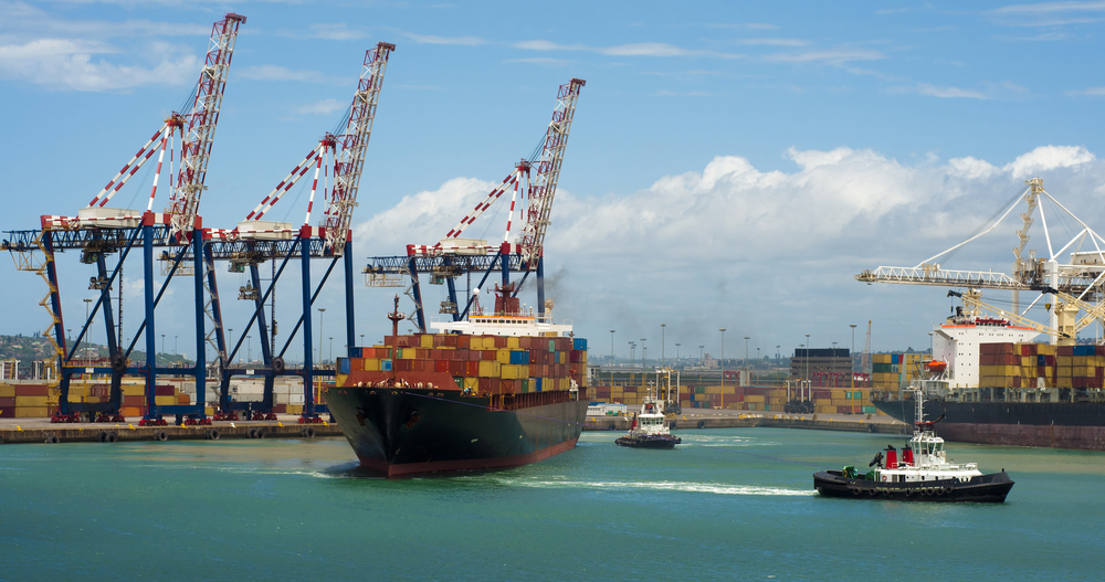 Container,Vessel,And,A,Small,Ship,,No,Logos,On,The