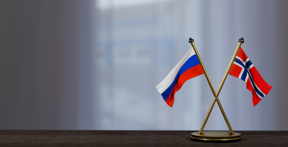 Russia,And,Norway,Flags,On,Table.,Negotiation,Between,Norway,And