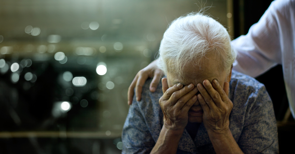 The,Daughter,Is,Comforting,An,Elderly,Woman,Who,Is,A