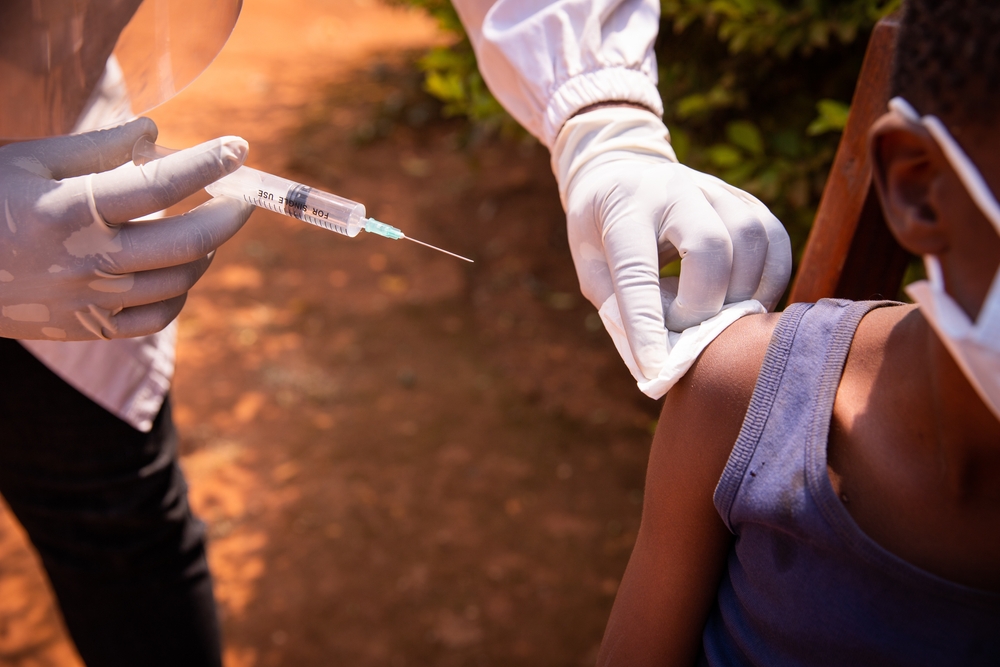 Close-up,Of,A,Doctor&rsquo;s,Hand,With,A,Syringe,About,To