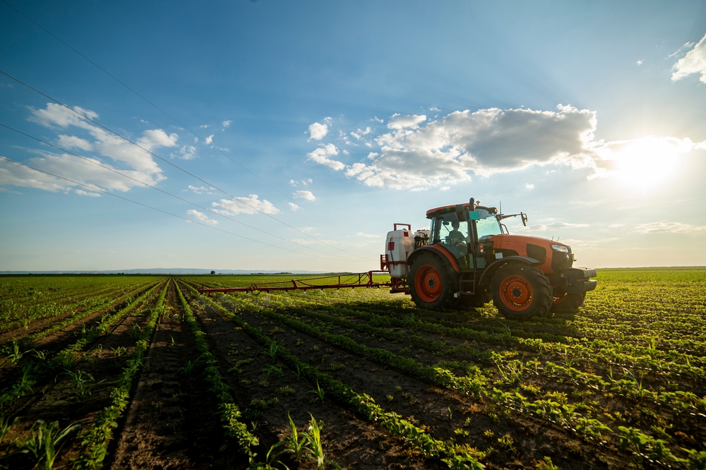 Tractor,Spraying,Pesticides,At,Soy,Bean,Fields