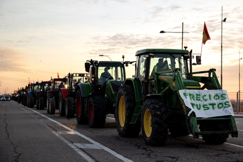 Spanish farmers march towards downtown Madrid