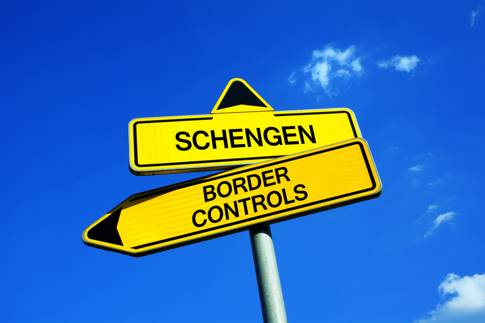 Schengen,Or,Border,Controls,-,Traffic,Sign,With,Two,Options