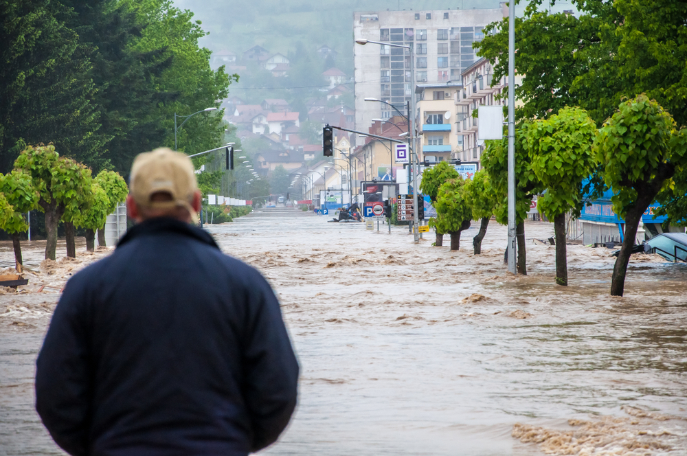 Doboj,/,Bosnia,,May,2014.,Man,Helplessly,Looking,At,Flooded