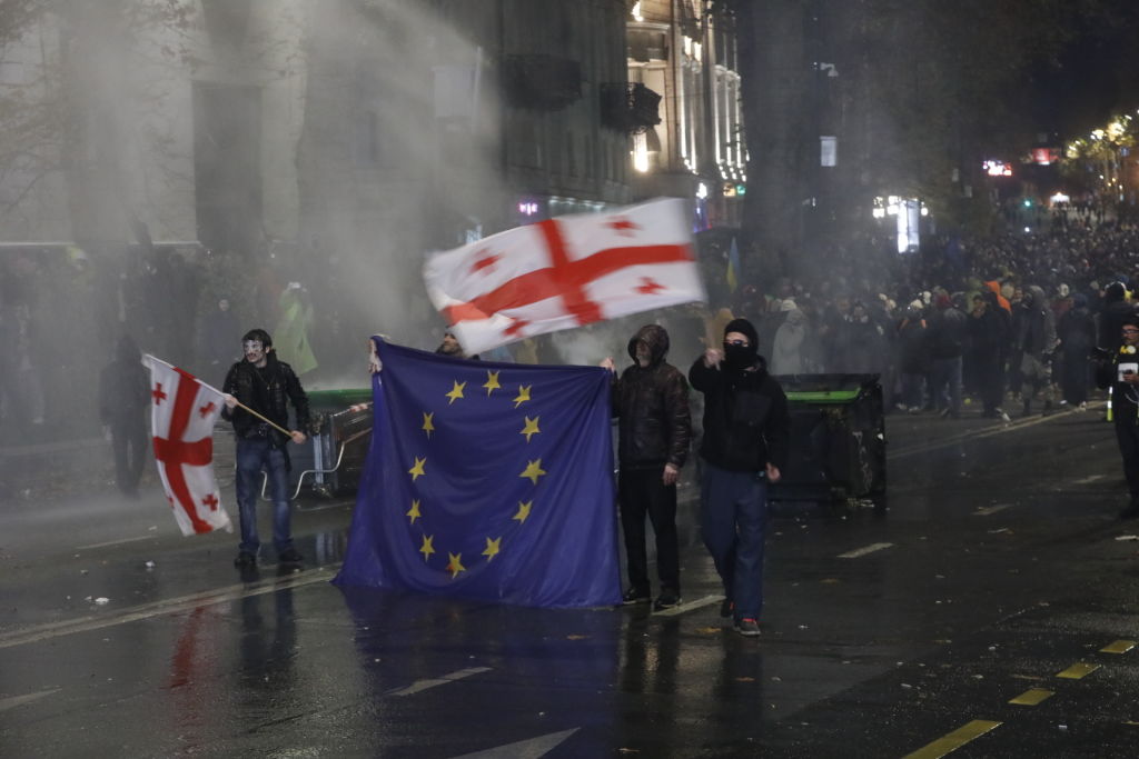 Georgian police use water cannons to disperse protesters in Tbilisi over EU negotiation delay