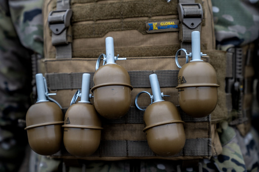 Ukrainian soldiers being trained for tactical infantry operations in rural area
