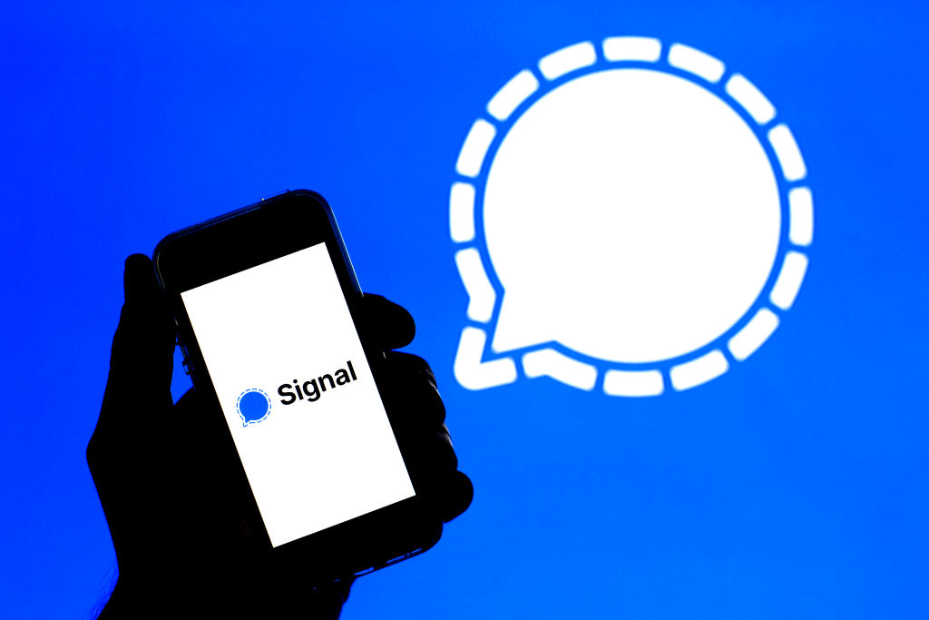 In this photo illustration a Signal app seen displayed on a