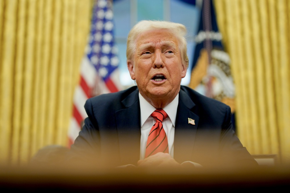 US President Trump signs executive order in Oval Office