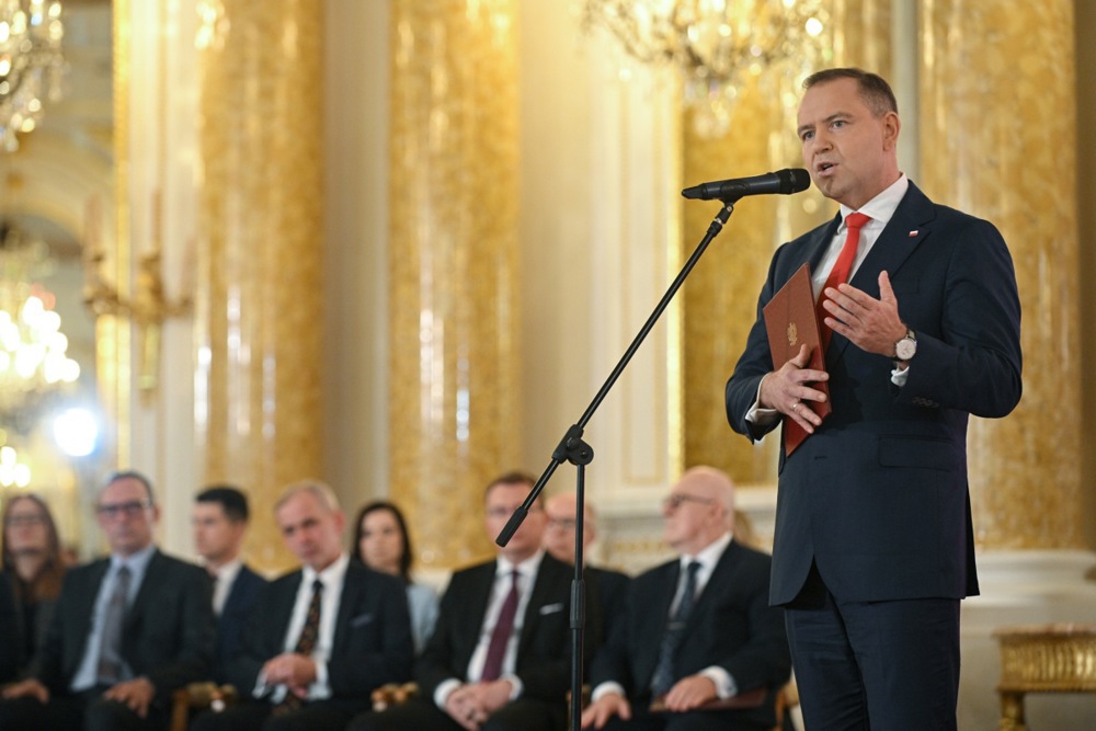 Polish President-elect Karol Nawrocki receives the winning certificate