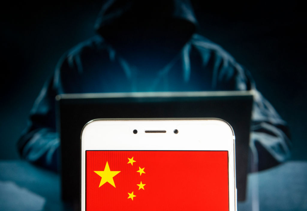 In this photo illustration a People&rsquo;s Republic of China flag