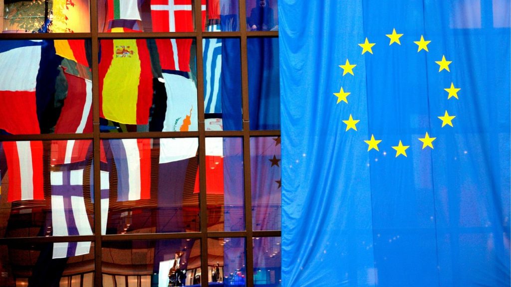 epa01282573 Flags are reflected in windows at the European Council headquarter in Brussels, Belgium, 12 March 2008, a day before an European Union (EU) heads of state summit begins. Energy and climate change are once more set to hit the headlines, as EU leaders will meet in Brussels to discuss European Commission proposals on how to turn ambitious green goals into concrete laws.  EPA/OLIVIER HOSLET