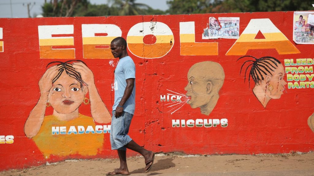 epa05959540 (FILE) – A Liberian man walk pass an ebola awareness painting on a wall in downtown Monrovia, Liberia, 22 March 2015 (reissued 12 May 2017). According to media reports, the World Health Organization (WHO) on 12 May 2017 declared the outbreak of ebola in the Democratic Republic Of Congo.  EPA/AHMED JALLANZO
