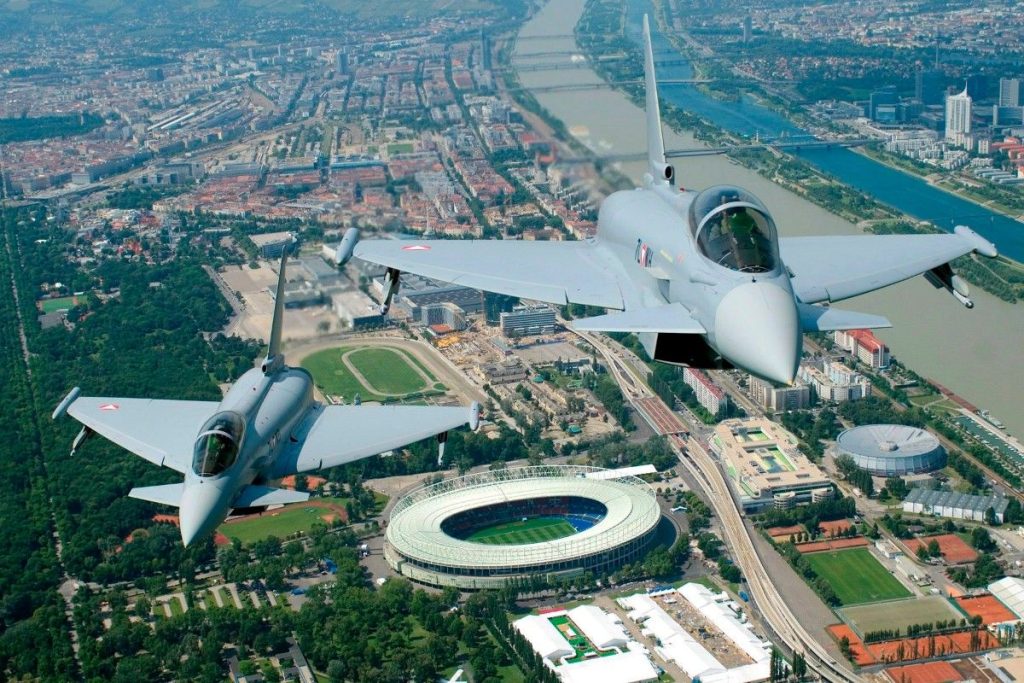 epa06073159 (FILE) A handout file photo made available by Austrian Ministry of Defence showing two Eurofighter fighter planes flying past the Ernst-Happel-Stadium in Vienna, one of the EURO 2008 soccer tournament venues, Vienna, 04 June 2008. Media reports on 07  July 2017 state Austrian Defence Minister Hans Peter Doskozil said Austria, that has sued Airbus and Eurofighter consortium in February 2017, would finish its Eurofighter plane program earlier than planned. Austria would replace the Eurofighter program with an alternative that is cheaper, and would consider leasing or buying planes from other governments.  EPA/BMLV/ ZINNER HANDOUT  HANDOUT EDITORIAL USE ONLY/NO SALES