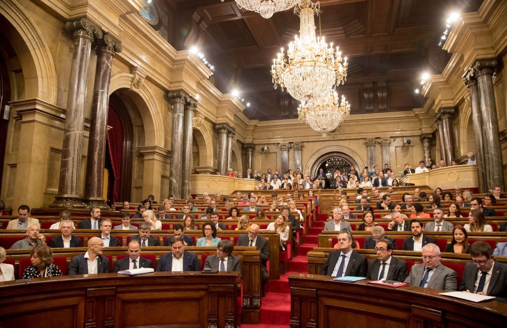 epa06246273 (FILE) – Catalonian Parliament members attend a parliamentary session to vote on the referendum law at Parliament in Barcelona, Spain, 06 September 2017 (reissued 05 October 2017). According to media reports on 05 October 2017, Spain’s Constitutional Court has ruled to suspend a session of the Catalonian Parliament scheduled for 09 October in an effort to prevent a push for independence.  EPA-EFE/MARTA PEREZ