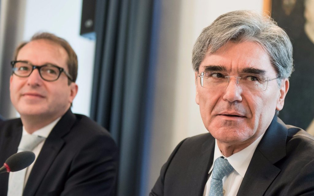 epa05700864 Joe Kaeser (R), CEO of Siemens AG, and German Transport Minister Alexander Dobrindt (L) attend the annual Christian Social Union (CSU) Epiphany meeting at Kloster Seeon, in Seeon, Germany, 06 January 2017. The closed door meeting of the CSU state parliamentary group will be held in the educational institution of former Benedictine monastery Seeon Abbey from 04 to 06 January 2017.  EPA/LUKAS BARTH